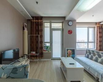 Dalian Xiuzhu Mansion Apartment - Dalian - Living room