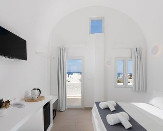 Voca Hotel & Suites - Kamari - Slaapkamer
