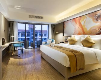 Orange Seasons International Hotel - Haikou - Habitación