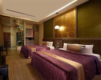 Sun Garden Motel Ming Cheng - Kaohsiung - Schlafzimmer