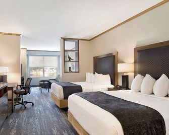 ClubHouse Hotel and Suites Pierre - Pierre - Bedroom