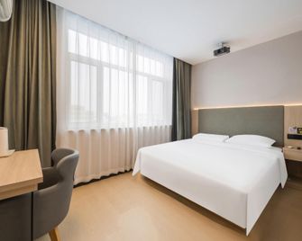 Home Inn - Huayi Select Hotel - Tianjin Wuqingchagugangkejigu Industrial Park Up - Tianjin - Slaapkamer