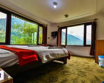 Hamdard Resorts - Pahalgam - Schlafzimmer