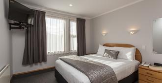 Amross Motel - Dunedin - Bedroom