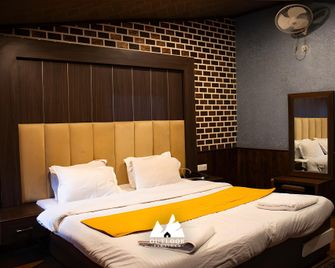 Hotel Outlook - Pahalgam - Slaapkamer