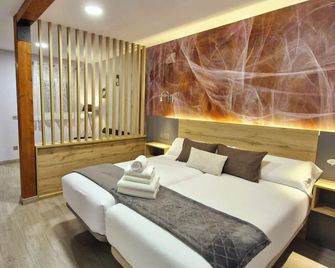 Feeling Home - Suites&Rooms - לאון - חדר שינה
