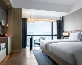 New World Langfang Hotel - Langfang - Bedroom