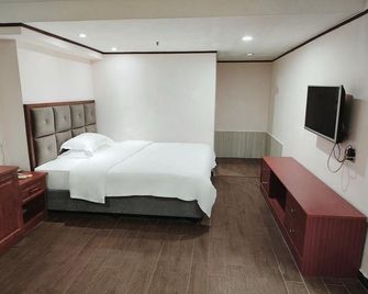 Guanlan Hotel - שנג'ן - חדר שינה