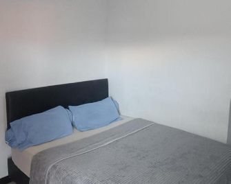 Wisma 88 - Gorontalo - Ložnice