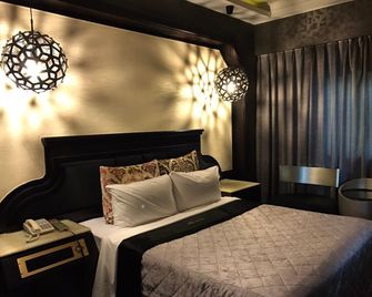 Sin Huan Motel - Taipei - Schlafzimmer