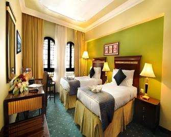 Taiba Suites Madinah - Medina - Schlafzimmer