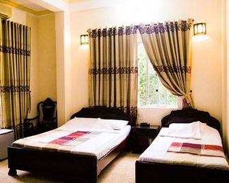 Binh Minh Sunrise Hotel - Hue - Makuuhuone
