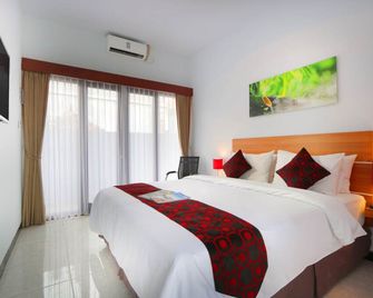 Valomia Guest House - Denpasar - Bedroom