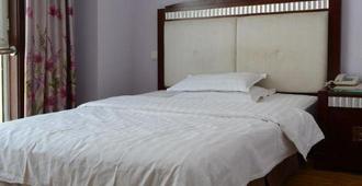 Qixing Hotel - Wuhai - Bedroom