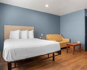 إكستنديد ستاي أميريكا سيليكت سويتس - أتلانتا - شامبلي - أطلنطا (جورجيا) - غرفة نوم