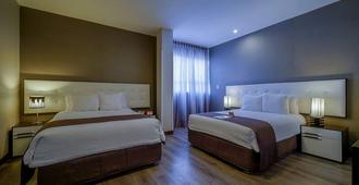 Limaq Hotel - Lima - Slaapkamer