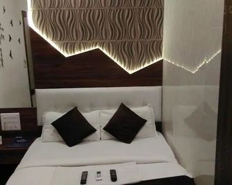 Hotel Palace Reisdency - מומבאי - חדר שינה