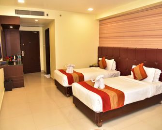 هوتل باتليبوترا نيرفانا - باتنا - غرفة نوم