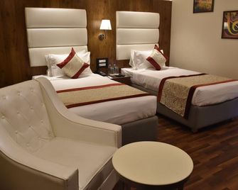 Ss Lumina Hotel - Bengaluru - Bedroom