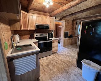 Waterfall Cabin - Pictured Rocks Lodging - Munising - Kitchen