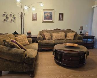 Ruby's private 2-bedroom home with parking. Recently renovated with flooring. - Canton - Living room