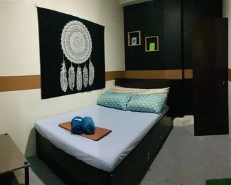 Napsule Suites - דבאו - חדר שינה