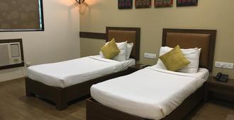 Hotel Amigo - Mumbai - Bedroom