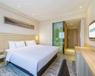 City Gengjie Hotel (Jiujiang Xiangyang Road Pedestrian Street Branch) - Jiujiang - Living room