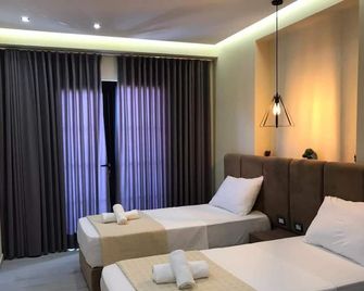 Hotel Sunway - Ksamil - חדר שינה