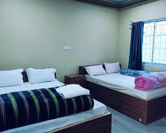 Hilsan Residency and Hotel - Bomdila - Bedroom