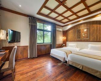 Qingshuiwan Hot Spring Holiday Village - Jinhua - Schlafzimmer
