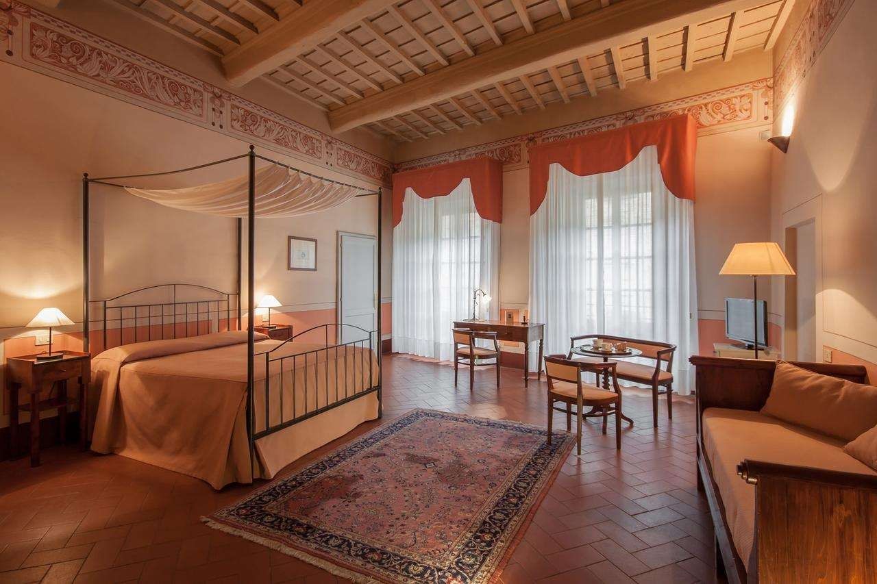 Hotel L' Antico Pozzo San Gimignano - סן ג'ימיניאנו - חדר שינה