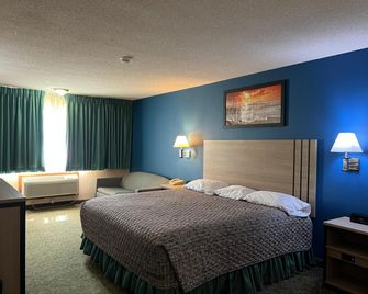 Capital O Marysville Surf Motel Kansas - Marysville - Bedroom