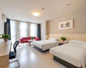 Jingjiang Inn Hotel Tianjin Zhongxin Eco-City Branch - Tianjin - Schlafzimmer