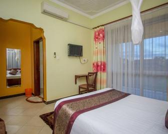 Jevine Hotel - Kampala - Habitación