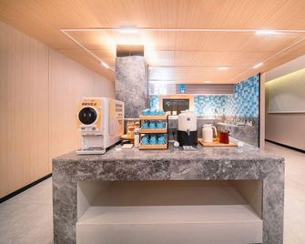 Xiyi Hotel (Lanzhou Wanda Plaza Rt-Mart Store) - Lanzhou - Front desk