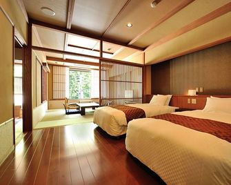 Matsunoyama Onsen Hinanoyado Chitose - Tokamachi - Bedroom