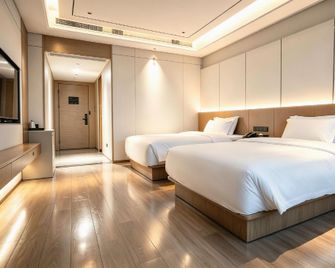 Spirior Hotel Foshan Lecong Furniture City - Foshan - Bedroom