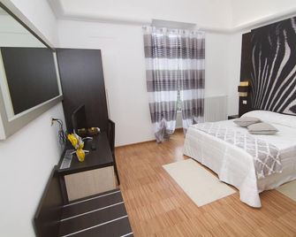 Al Bastione Relais Suite & Rooms - Gravina in Puglia - Bedroom