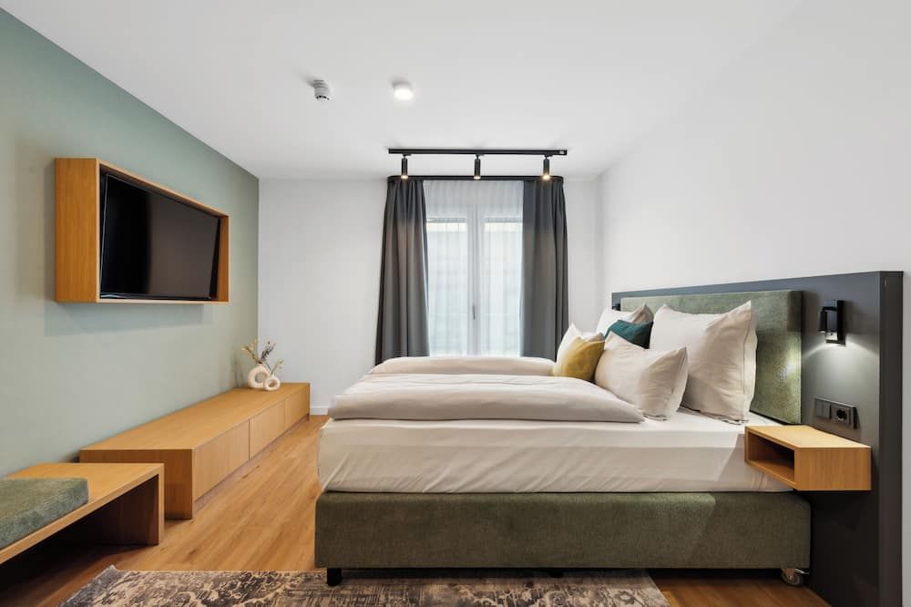 نينا أبارتمنتس مونشين سيتي - ميونخ - غرفة نوم