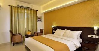 Hotel Town Tower - Thiruvananthapuram - Phòng ngủ