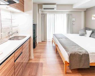 شينكو هاوس او - أوساكا - غرفة نوم