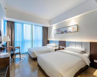 Jinjiang Metropolo Hotel Changsha Wuyi Square - ฉางชา - ห้องนอน