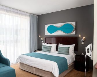 Tlotlo Hotel and Conference Center - Gaborone - Slaapkamer