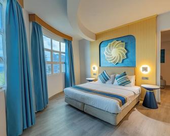 UMET Seaview Hotel with Free Airport Pick up and Drop T&C Apply - Malé - Soveværelse