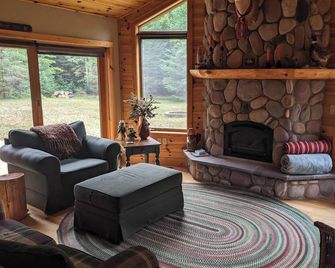 Private home on 20 acres - Located close to State Park, Lakes and ORV Trails - Alanson - Living room
