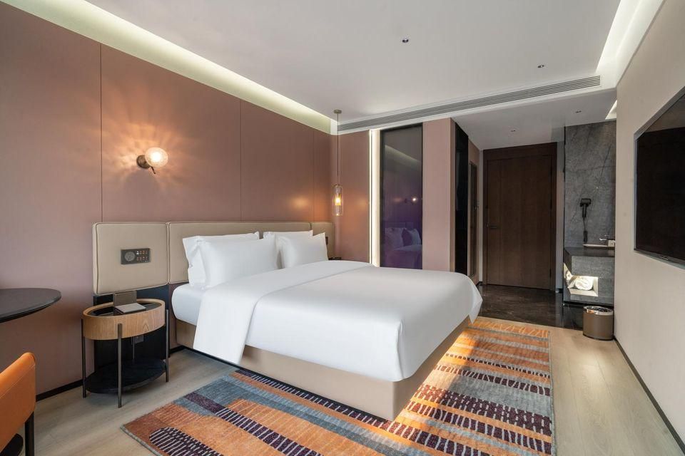 Chuntian Fashion Express Hotel Harbin Hexing Road - هاربين - غرفة نوم