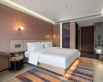 Chuntian Fashion Express Hotel Harbin Hexing Road - هاربين - غرفة نوم