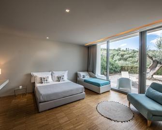Alkimia boutique hotel - 바스토 - 침실
