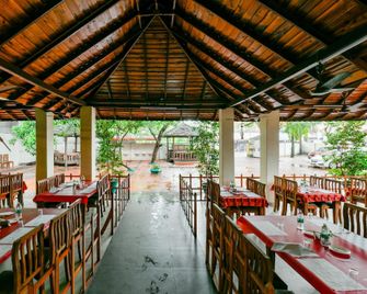 Collection O Green Aura Resort Alappuzha - Alappuzha - Restaurante